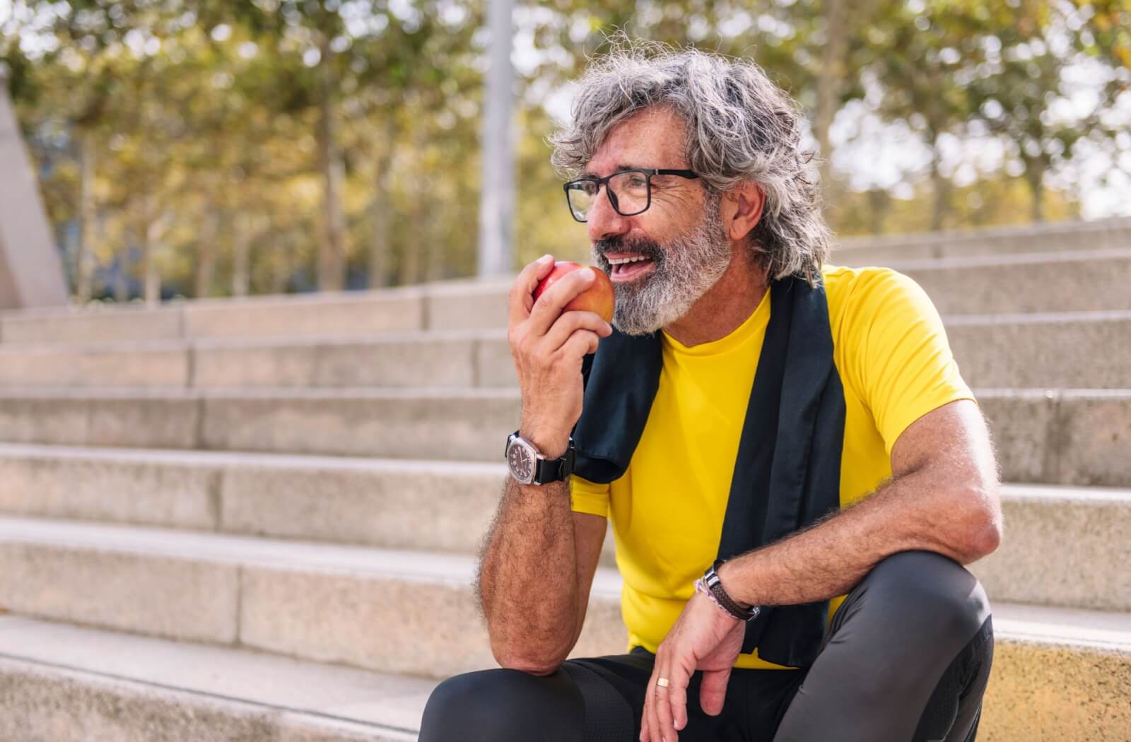 An older adult fuels his morning job with a complex carbohydrate-filled snack.